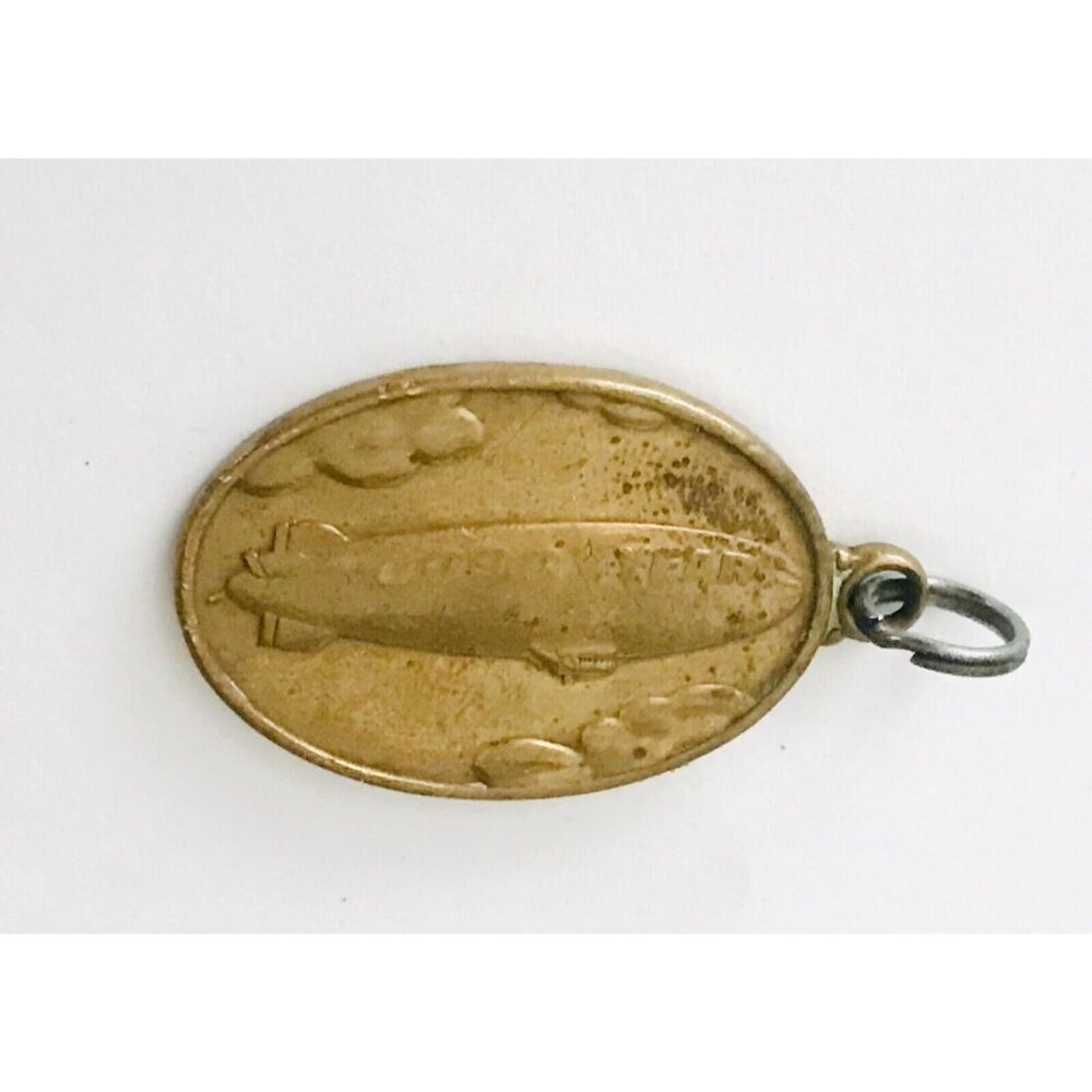 Vtg Goodyear Blimp Goodyear Tire & Rubber Brass Medallion Fob Key Ring Oval